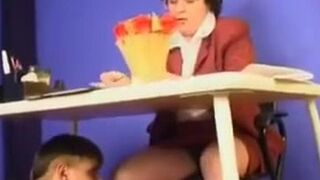 Mature teacher copulates with naughty student on desk