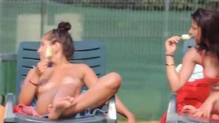 Topless babes are secretly filmed while they tan